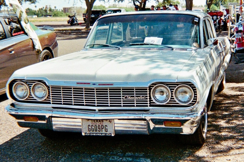 Leica M3 + Ilford Ilfocolor 400 Plus Vintage Tone + 35mm + Light blue/silver 1964 Chevrolet Impala front with Texas plate GG09PG