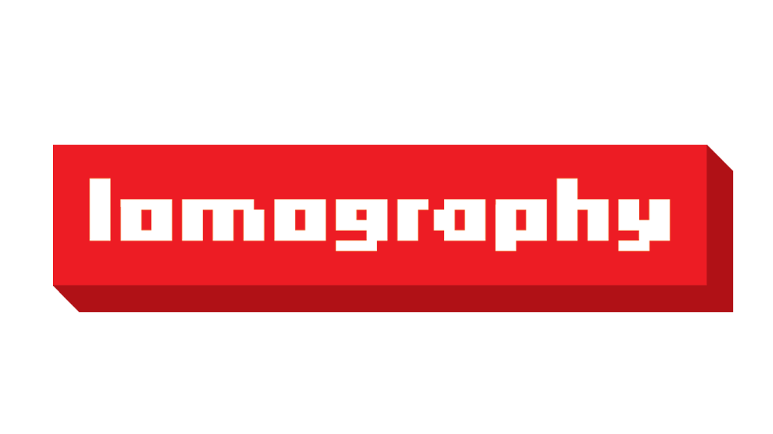 Red rectangular logo with the word ’lomography’ in white pixelated font.