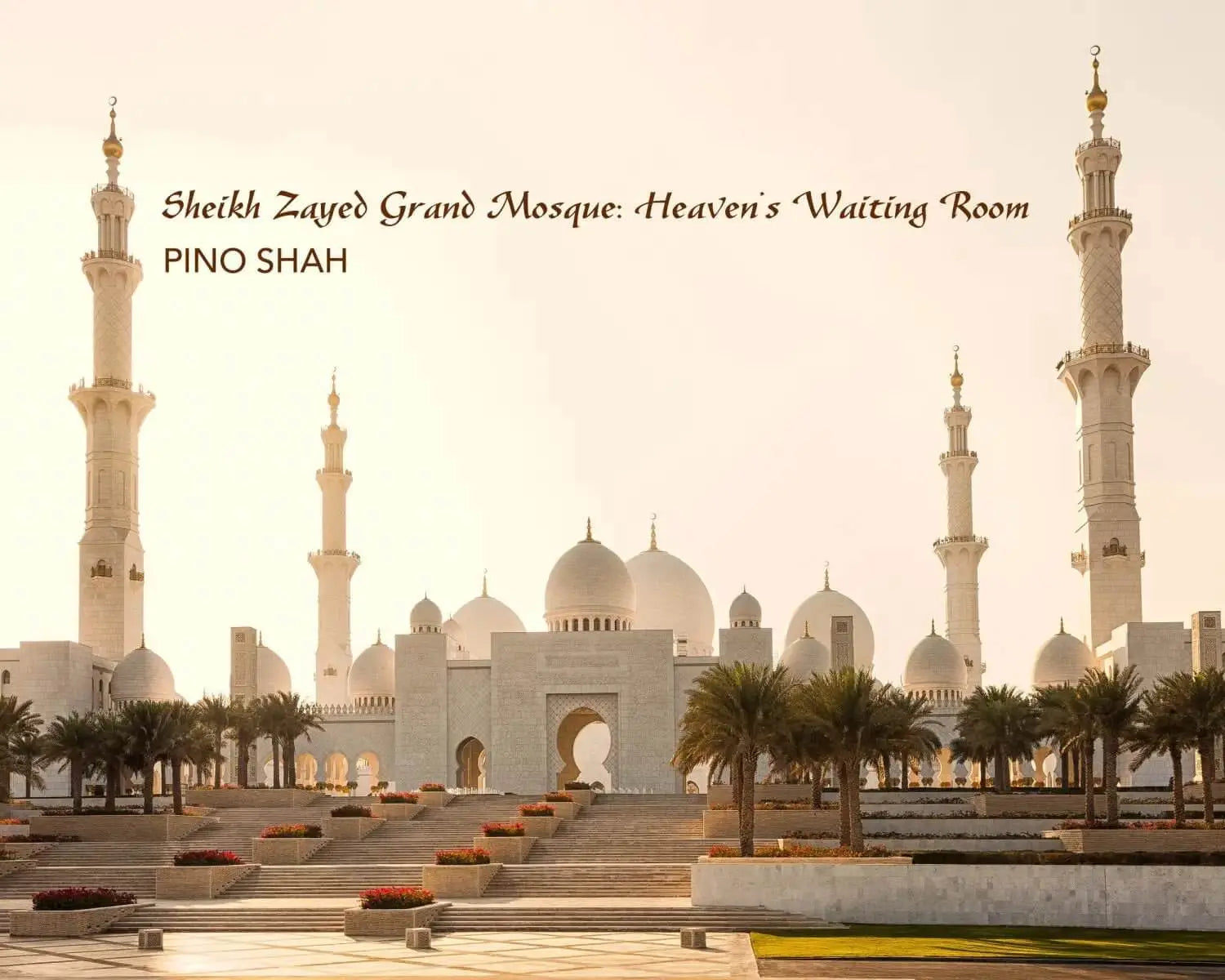 The sheikh zayed grand mosque, a majestic white marble structure with multiple domes and towering minarets.
