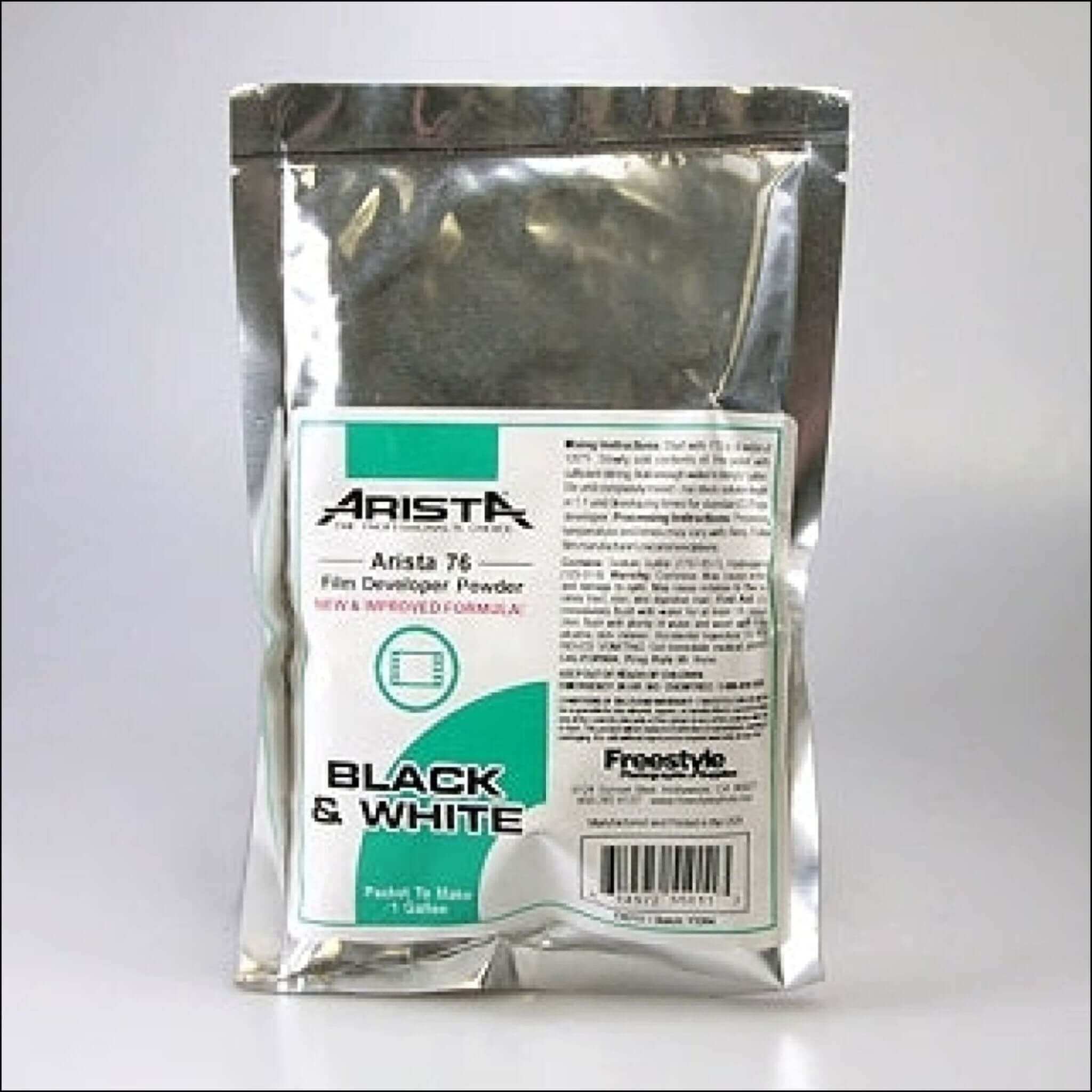 Arista 76 film developer powder in a silver foil pouch with green and white labeling, designed for black & white photography.