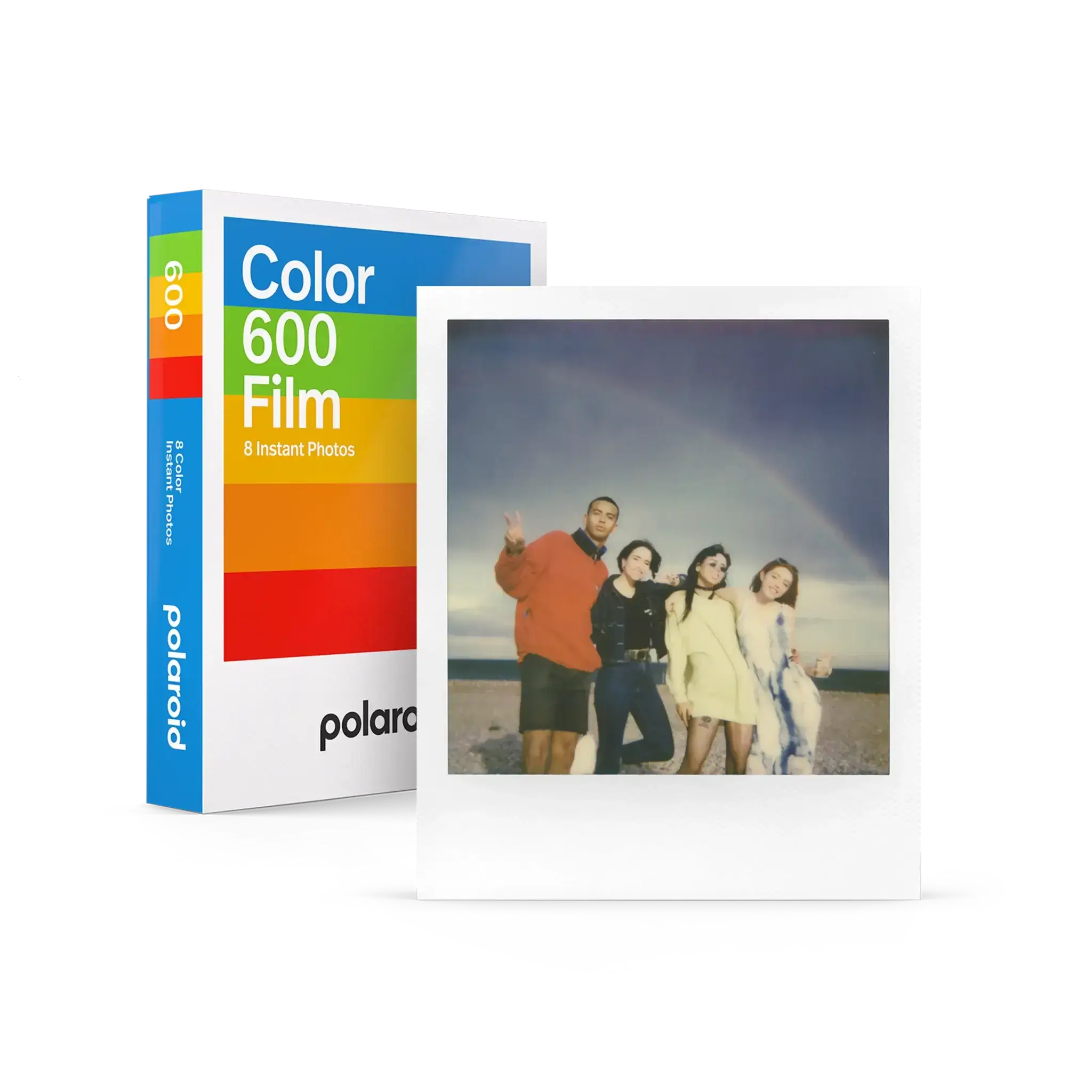 Polaroid color 600 film pack with rainbow-striped box and a white-bordered instant photo of four people on the beach.