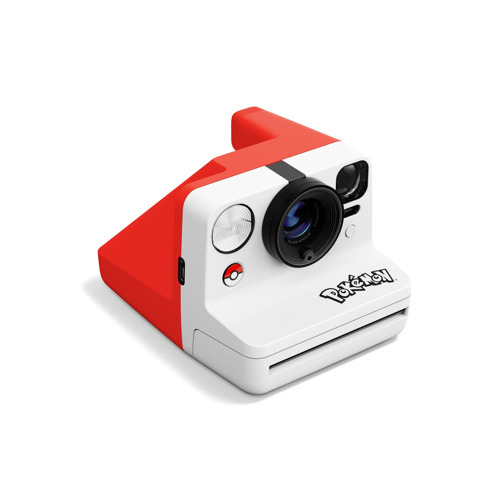 Side angle of the Polaroid Now Gen 3 Pokémon Edition showing the red Poké Ball top and white body