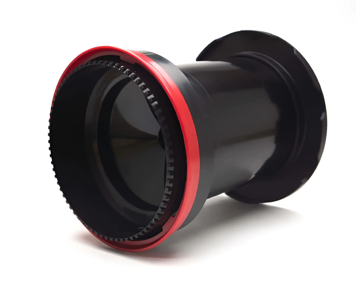 Black and red bicycle bottom bracket with a textured outer ring.