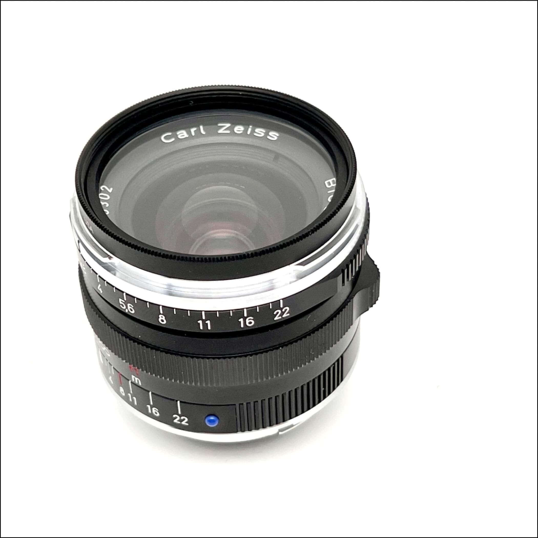 Black and silver carl zeiss lens with a classic, vintage design.