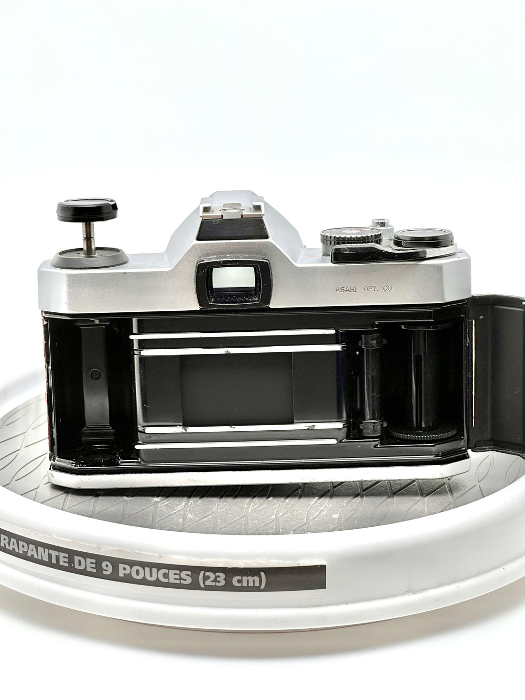 Silver-bodied, vintage asahi pentax 67 camera with black accents and a classic rangefinder design.