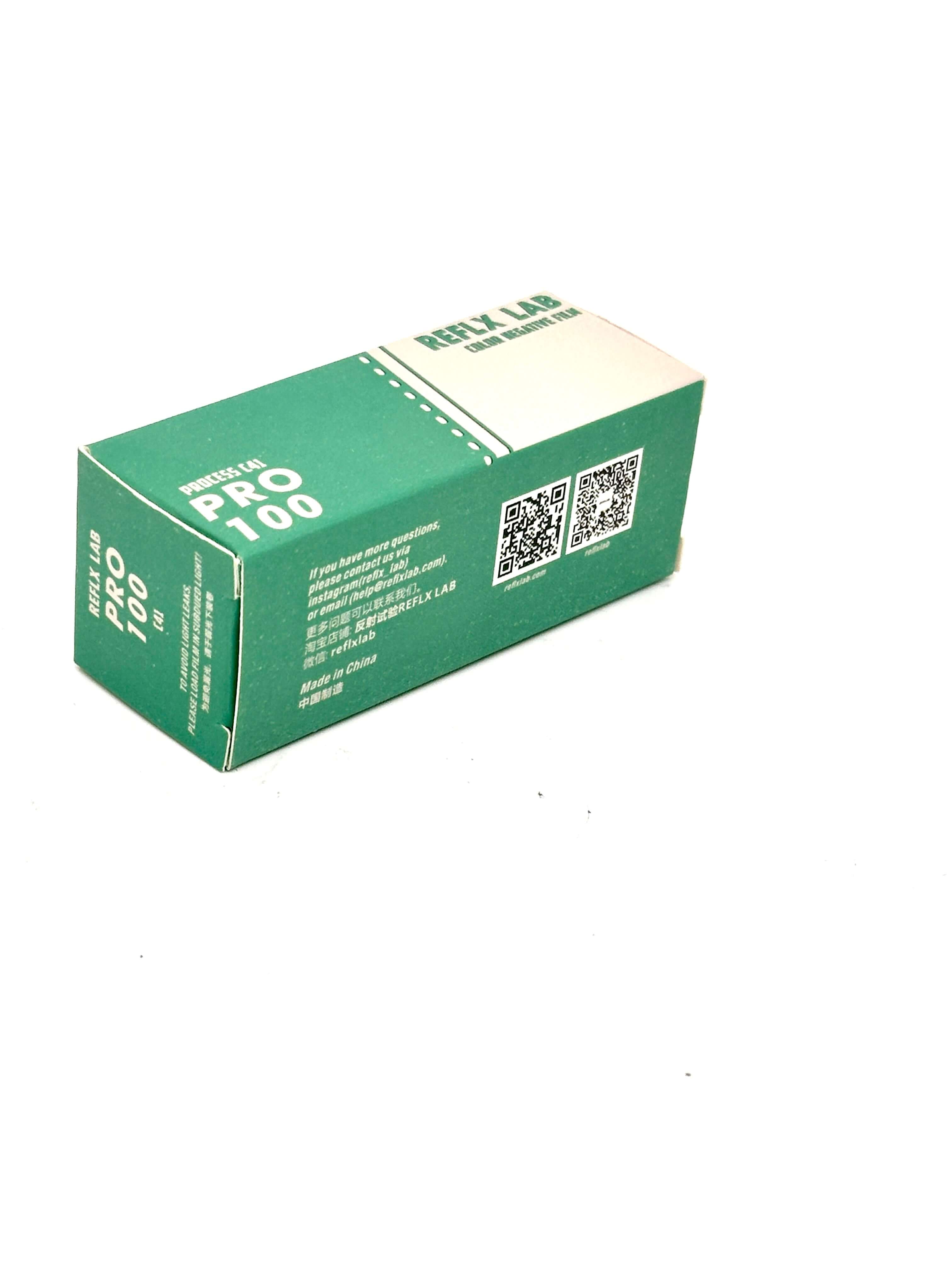 Green rectangular box with white text and qr codes, labeled ’reply lab pro 100’’ on its sides.