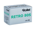 Silver rollei retro 80s black and white film box with green lettering.