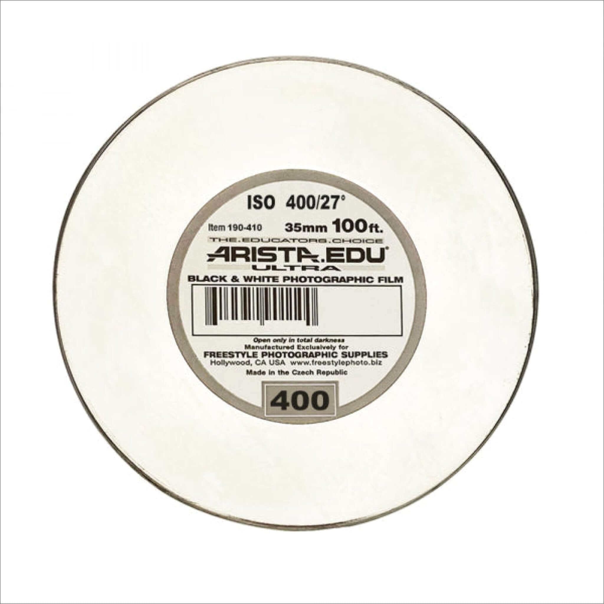 Arista edu ultra black and white photographic film spool, 35mm, iso 400/27°, with a silver label on an off-white plastic core.