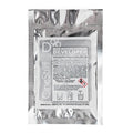 Silver foil packet of b&w motion picture developer labeled ’cinestill d96’’