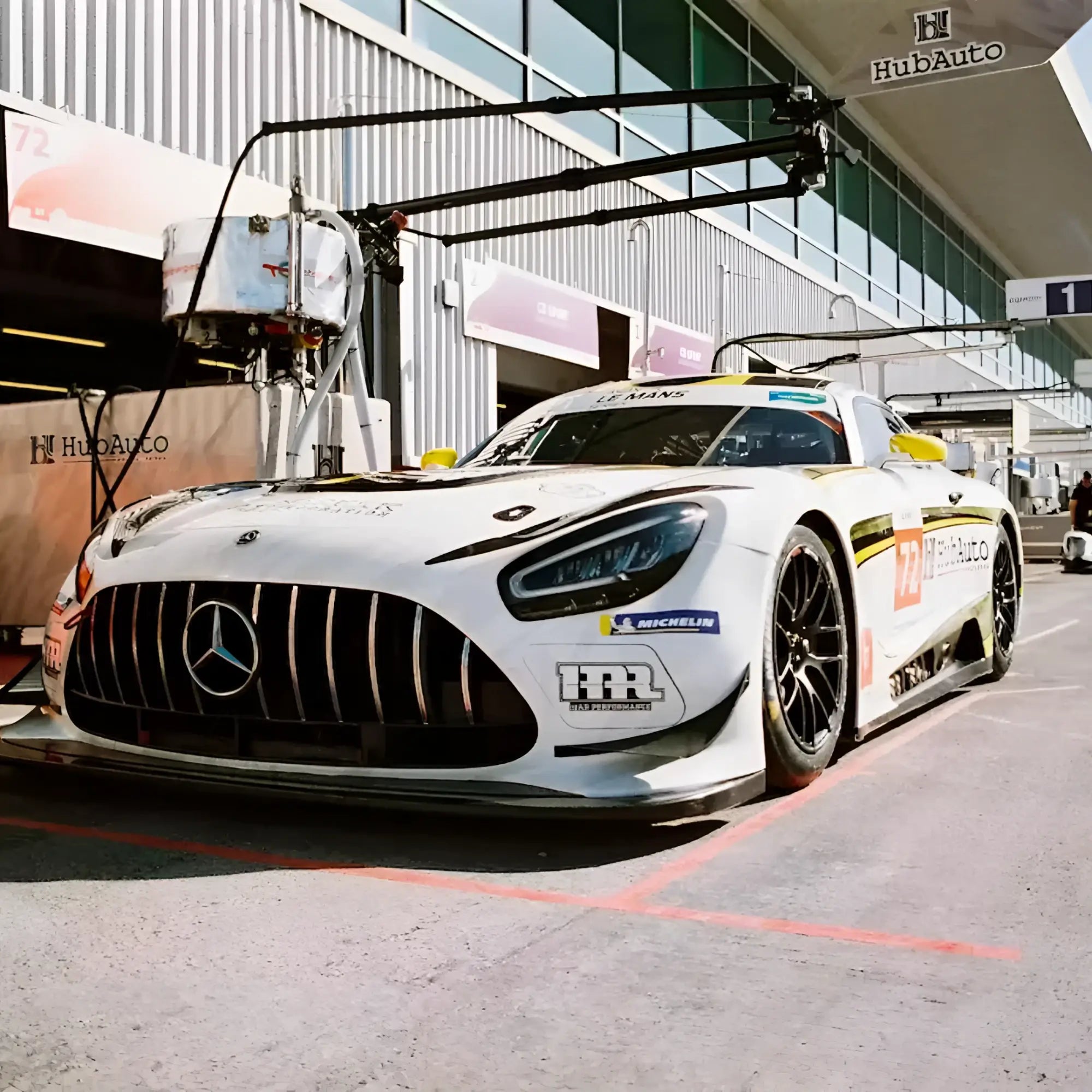 White mercedes-amg gt3 race car with black and yellow decals on candido c41 color 200 iso 35x36 35mm color negative film