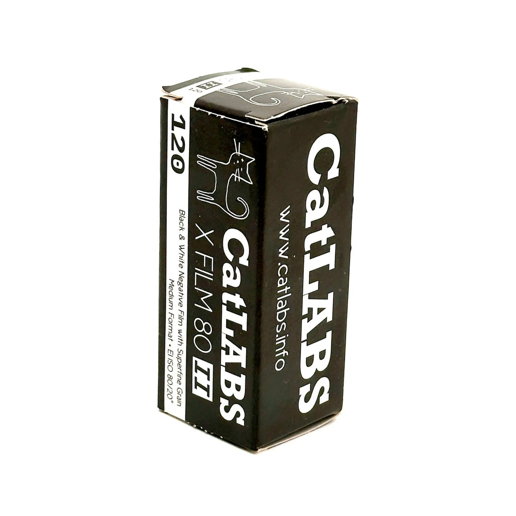 Black rectangular box of catlabs x film 80 ii black and white negative film with a stylized cat logo.