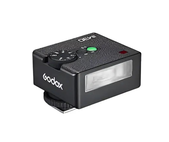 Black godox ad200 flash trigger with a textured surface and a rectangular light panel.