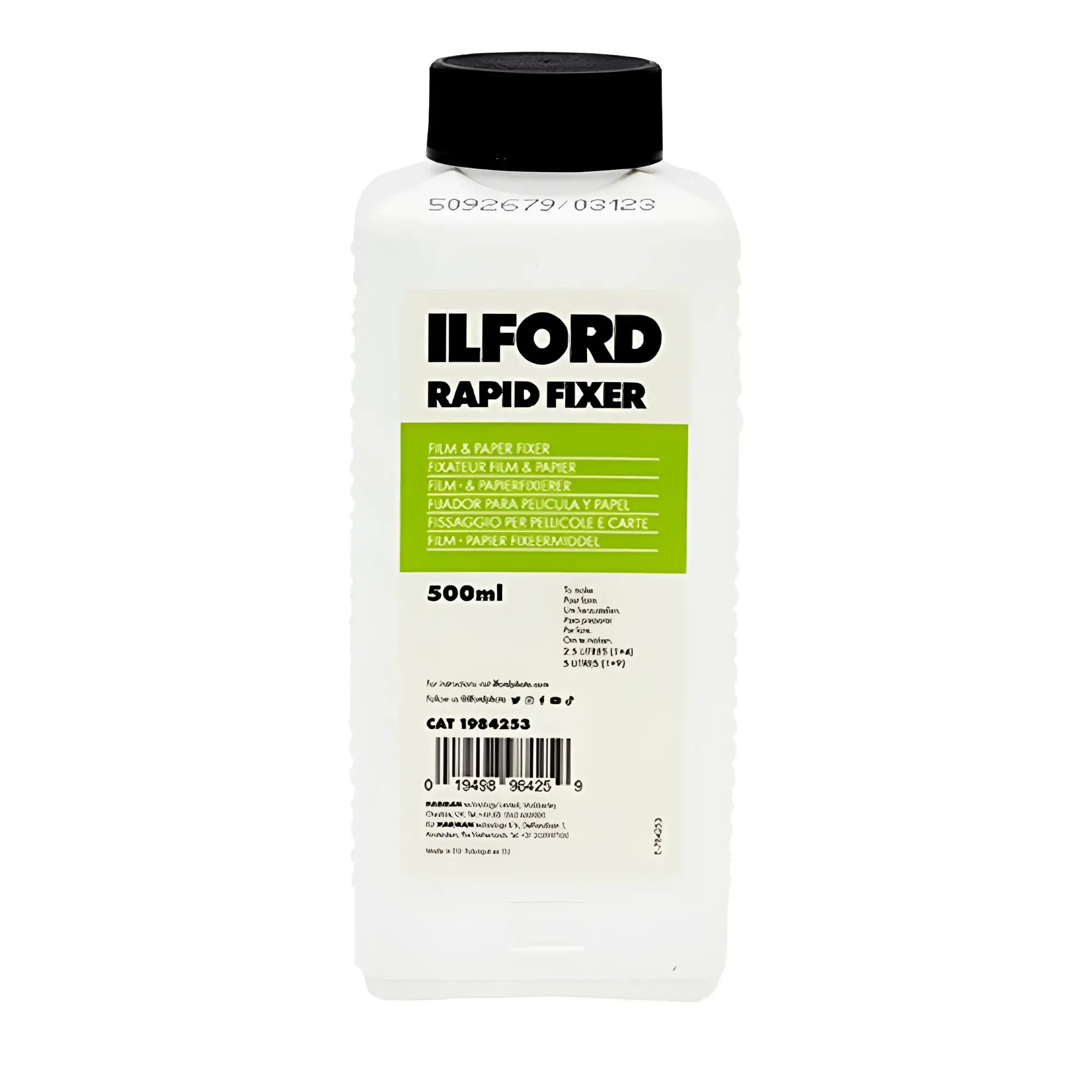 White plastic bottle with black cap, labeled ’ilford rapid fixer’ in bold black text on a green rectangular background.