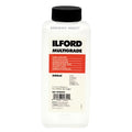 A clear plastic bottle with a black cap, labeled ’ilford multigrade’ in bold black text on a white label featuring an orange rectangular section.