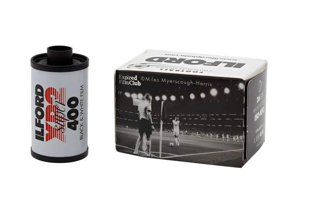 Ilford xp2 super black and white 35mm film roll with silver body and bold red black and white branding