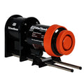 Black and orange industrial film processing unit with a prominent red-orange circular cap.