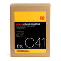 Kodak c-41 color negative film processing kit in a brown cardboard box with a yellow and black label.