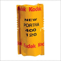 Yellow kodak portra 400 film pack for 120 format, featuring bold red and black text on a glossy plastic wrapper.