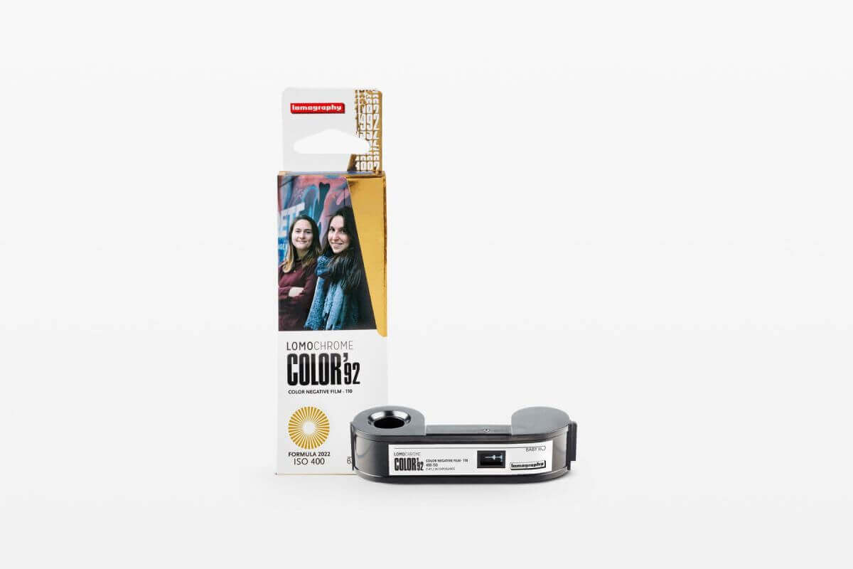 Lomography Color ’92 400/110 film pack with camera, showcasing vintage photography charm and retro aesthetics.