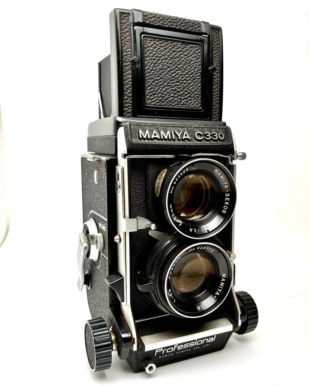 Mamiya C330 professional twin-lens reflex camera on a white background