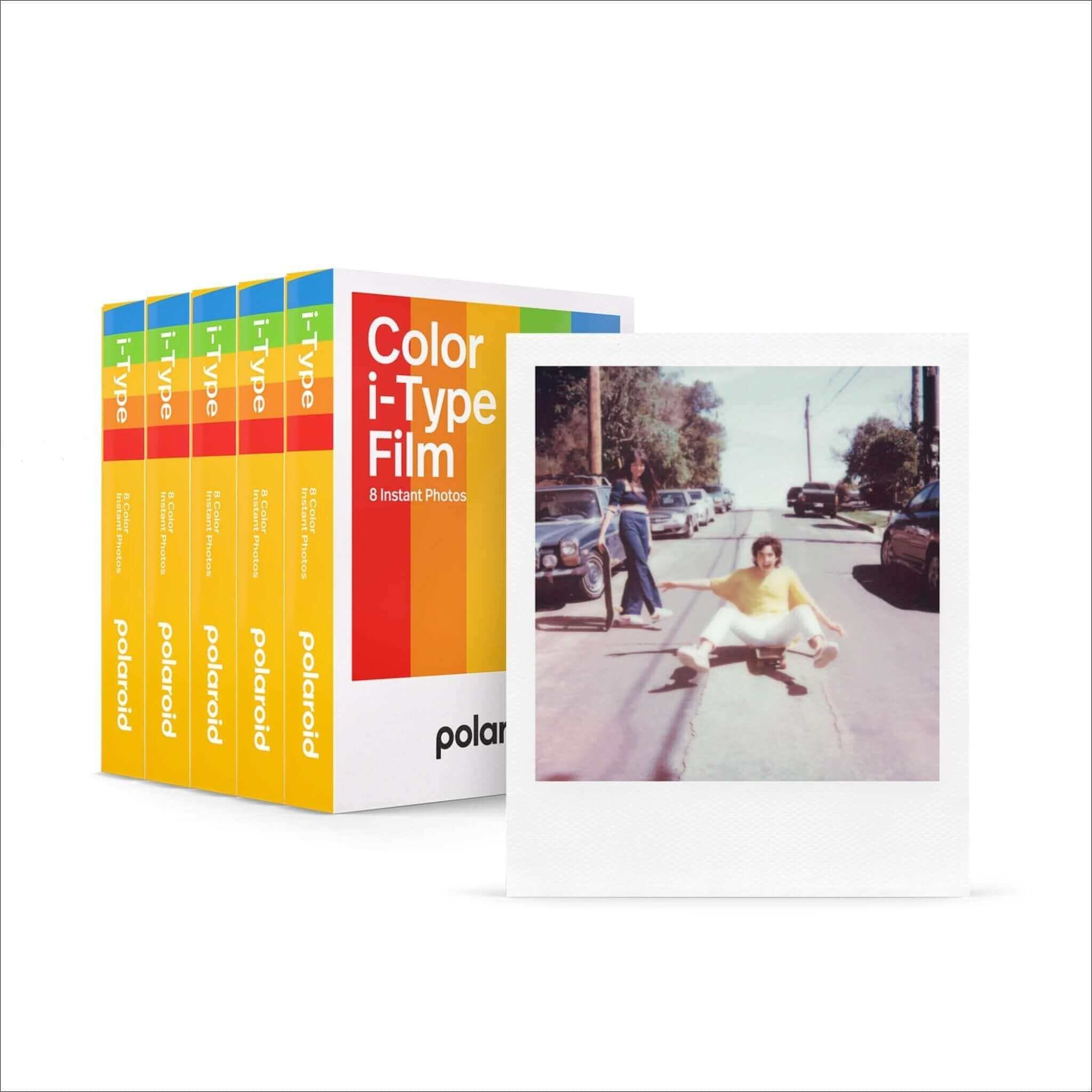Polaroid color i-type film pack with rainbow-striped boxes and a sample instant photo.