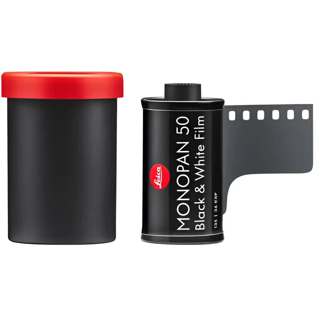 Black leica monopan 50 black & white film canister with red cap and exposed film strip.