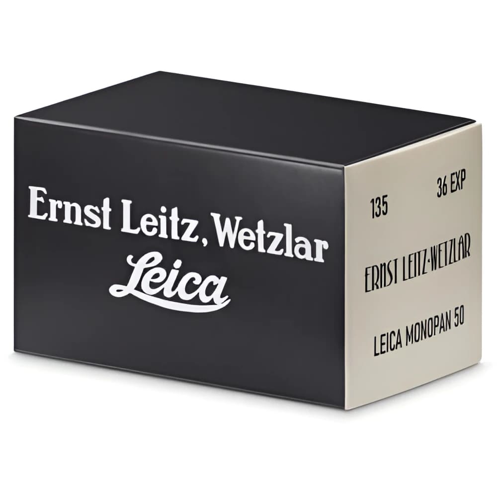 Black rectangular box with white lettering and logo, labeled ’ernst leitz, wetzlar’ and ’leica,’ indicating it contains a leica monopan 50 lens.
