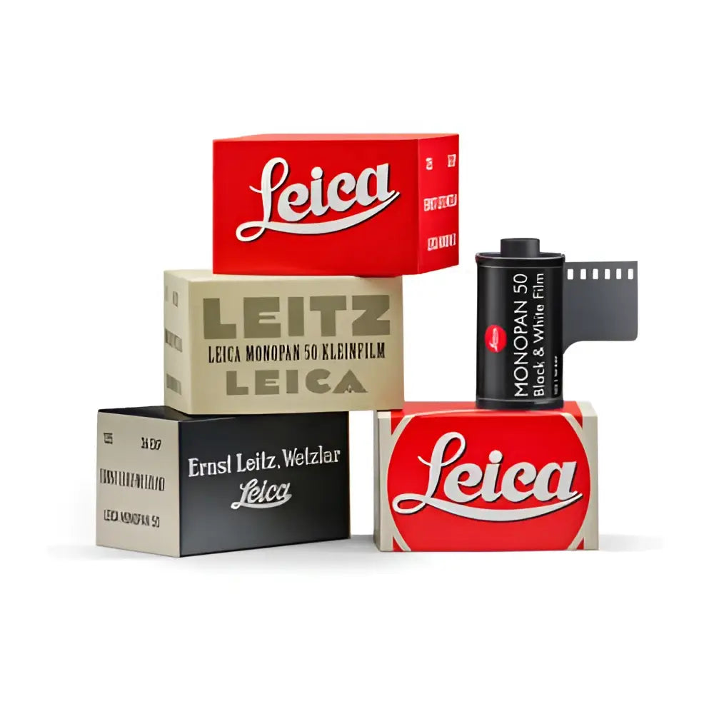 Red leica film canister with black and white label.