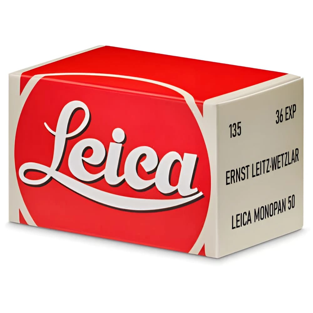 Red and white leica camera film box labeled ’leica monopan 50’’ with black text.